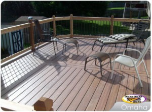 A low maintenance deck with patio chairs