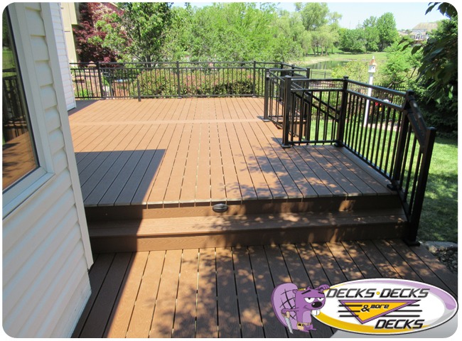Bellevue backyard shown before and after a composite deck expansion