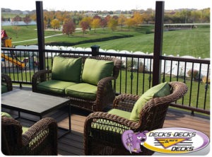 A low maintenance second story deck with patio furniture