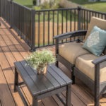 Patio furniture on a second story low maintenance deck