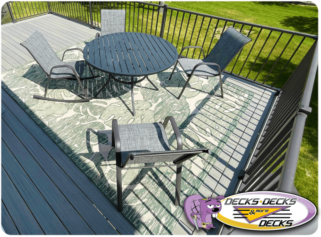 Springfield composite deck arranged with outdoor dining set and string lighting