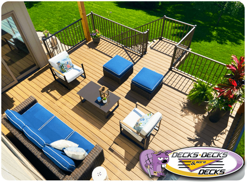 West Omaha composite deck with outdoor dining set and umbrella